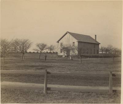 Wooden structure that may be the only photograph of the old gymnasium, matching [[https://www.jstor.org/stable/community.32704259|one student's description]] in an 1894 //Trinity Tablet//.