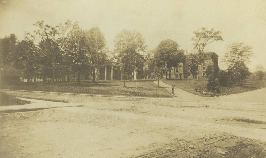 Title: Trinity College Old Campus from the head of Elm Street. Eastern facade of
campus buildings viewed from northeast (left to right: Jarvis Hall, 1825-1878;
Seabury Hall, 1825-1878; Brownell Hall, 1845-ca.1877); Image ID:...